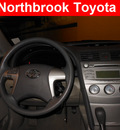toyota camry 2010 green sedan le 4 cylinders front wheel drive automatic 60062