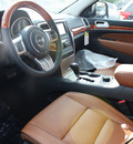 jeep grand cherokee 2012 black suv overland summit gasoline 6 cylinders 4 wheel drive automatic 07730