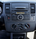 nissan versa 2007 black hatchback 1 8 s gasoline 4 cylinders front wheel drive 6 speed manual 98371