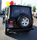 jeep wrangler 2004 black suv sahara gasoline 6 cylinders 4 wheel drive automatic with overdrive 98371