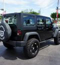 jeep wrangler unlimited 2012 px8 black clear coa suv sport gasoline 6 cylinders 4 wheel drive automatic 33021