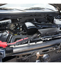 ford f 150 2010 black lariat flex fuel 8 cylinders 4 wheel drive automatic 77388