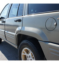 jeep grand cherokee 1997 green suv limited gasoline 8 cylinders 4 wheel drive automatic 77388