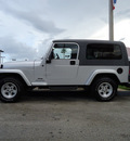 jeep wrangler 2005 silver suv unlimited gasoline 6 cylinders 4 wheel drive automatic 33157
