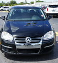 volkswagen jetta 2010 black sedan limited edition gasoline 5 cylinders front wheel drive automatic 33021