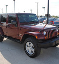 jeep wrangler unlimited 2007 red suv sahara gasoline 6 cylinders 4 wheel drive automatic with overdrive 76087