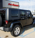 jeep wrangler unlimited 2010 black suv sahara gasoline 6 cylinders 4 wheel drive automatic 76210