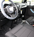 jeep wrangler 2012 black suv rubicon gasoline 6 cylinders 4 wheel drive 6 speed manual 07730