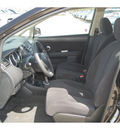 nissan versa 2011 black hatchback 1 8 s gasoline 4 cylinders front wheel drive automatic 77090