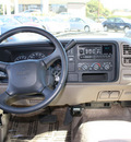gmc yukon 1999 pewter suv sle gasoline v8 rear wheel drive automatic 94010