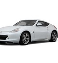 nissan 370z 2011 white coupe gasoline 6 cylinders rear wheel drive not specified 98371