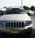 jeep grand cherokee 2004 tan suv special edition gasoline 6 cylinders 4 wheel drive automatic with overdrive 07730