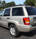 jeep grand cherokee 2004 tan suv special edition gasoline 6 cylinders 4 wheel drive automatic with overdrive 07730