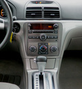 saturn aura 2007 maroon sedan xe gasoline 6 cylinders front wheel drive automatic 55124