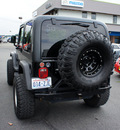 jeep wrangler 1999 black suv sport gasoline 6 cylinders 4 wheel drive 5 speed manual 98371