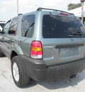 ford escape 2005 green suv xlt gasoline 6 cylinders front wheel drive automatic 32778