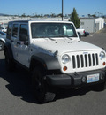 jeep wrangler unlimited 2009 white suv rubicon gasoline 6 cylinders 4 wheel drive 6 speed manual 99212