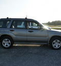 subaru forester 2006 gold wagon 2 5 x gasoline 4 cylinders all whee drive 4 speed automatic 27569