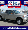 ford f 150 2010 gold pickup truck 4x4 xlt supercab gasoline 8 cylinders 4 wheel drive automatic with overdrive 55321