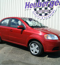chevrolet aveo 2010 red sedan ls gasoline 4 cylinders front wheel drive automatic 80905