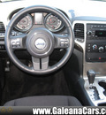 jeep grand cherokee 2011 silver suv laredo gasoline 6 cylinders 2 wheel drive 5 speed automatic 33912