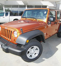 jeep wrangler unlimited 2011 orange suv sport gasoline 6 cylinders 4 wheel drive automatic 81212
