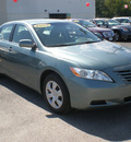 toyota camry 2009 green sedan gasoline 4 cylinders front wheel drive automatic 13502