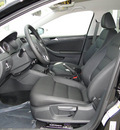 volkswagen jetta 2012 black hatchback se with convenience pzev gasoline 5 cylinders front wheel drive 5 speed manual 98226