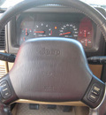 jeep wrangler 2002 green suv sahara gasoline 6 cylinders 4 wheel drive 5 speed manual 33884