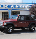 jeep wrangler unlimited 2010 red suv sport gasoline 6 cylinders 4 wheel drive automatic 27591