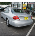 ford taurus 2004 silver frost sedan lx gasoline 6 cylinders front wheel drive automatic 07724