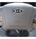 kia spectra 2009 beige sedan ex gasoline 4 cylinders front wheel drive 5 speed manual 77065