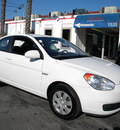 hyundai accent 2007 white hatchback gs gasoline 4 cylinders front wheel drive 5 speed manual 92882