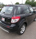 suzuki sx4 2009 black pearl met hatchback crossover gasoline 4 cylinders all whee drive automatic 81212