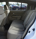 nissan versa 2011 white hatchback gasoline 4 cylinders front wheel drive 6 speed manual 98371
