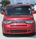 nissan cube 2009 red suv gasoline 4 cylinders front wheel drive automatic 33884