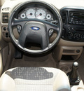 ford escape 2001 beige suv xls 4 cylinders 5 speed manual 76108