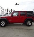 jeep wrangler unlimited 2010 red suv sport gasoline 6 cylinders 2 wheel drive automatic 33157
