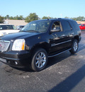gmc yukon 2011 black suv denali flex fuel 8 cylinders all whee drive automatic with overdrive 28557