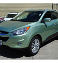 hyundai tucson 2011 green gls gasoline 4 cylinders front wheel drive automatic 94010