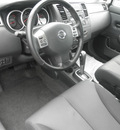 nissan versa 2009 silver sedan 1 8 s gasoline 4 cylinders front wheel drive automatic 34788