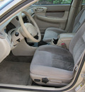 chevrolet impala 2005 tan sedan gasoline 6 cylinders front wheel drive automatic 77037