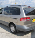 toyota sienna 2001 tan van ce gasoline 6 cylinders dohc front wheel drive automatic 77037