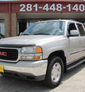 gmc yukon xl 2004 silver suv slt flex fuel 8 cylinders rear wheel drive automatic 77037