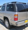 chevrolet tahoe 2002 silver suv flex fuel 8 cylinders 4 wheel drive automatic 77037