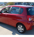 chevrolet aveo 2009 red hatchback lt w 1lt gasoline 4 cylinders front wheel drive automatic 77090