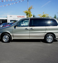 kia sedona 2003 green van ex gasoline 6 cylinders front wheel drive automatic with overdrive 98371