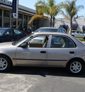 toyota corolla 2000 silver sedan ce gasoline 4 cylinders front wheel drive automatic with overdrive 94063