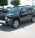 jeep patriot 2008 black suv limited gasoline 4 cylinders 4 wheel drive automatic 33157