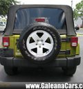 jeep wrangler unlimited 2007 grn suv sahara gasoline 6 cylinders rear wheel drive not specified 33912